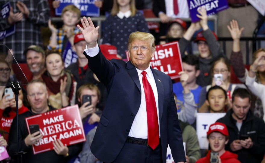 President Trump arrives at a campaign rally for Republican Senate candidate Mike Braun in Fort Wayne, Ind., on Monday. Braun defeated Democratic incumbent Sen. Joe Donnelly.