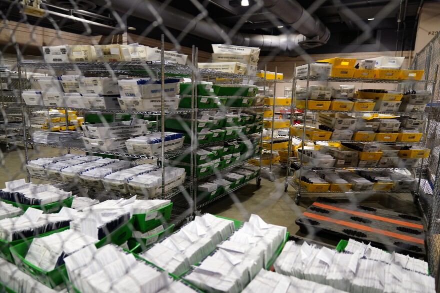 Ballots at Philadelphia's mail-in ballot sorting and counting center, Oct. 26. Under state law, counties can't open ballots to prepare them for counting until 7 a.m. on Election Day. That's one reason why Philadelphia spent $5 million on new equipment to speedily process mail-in ballots.