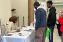 Two students speak with a mental health expert to learn coping mechanisms and support systems at the second annual Youth Mental Health Summit in downtown Cleveland.