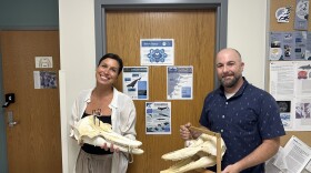 UNCW's Dr. Tiffany Keenan and Dr. Michael Tift of the marine mammal stranding program.