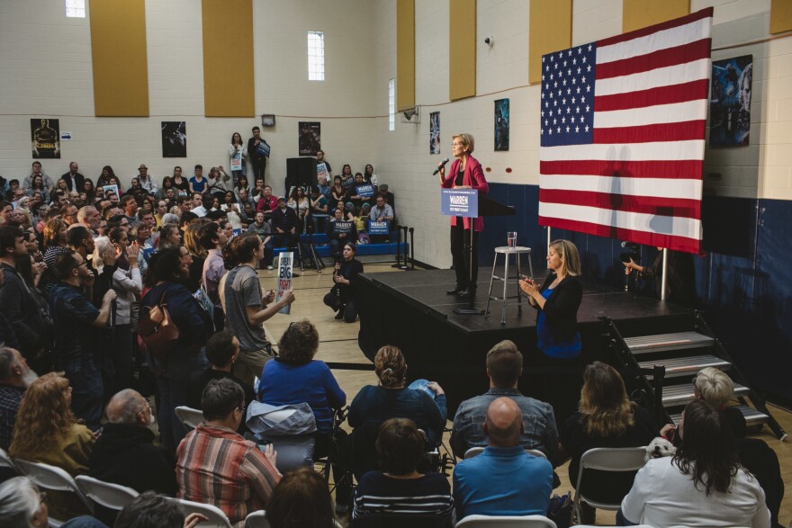 Warren speaks to a large crowd at a campaign stop at an elementary school in Columbus, Ohio.