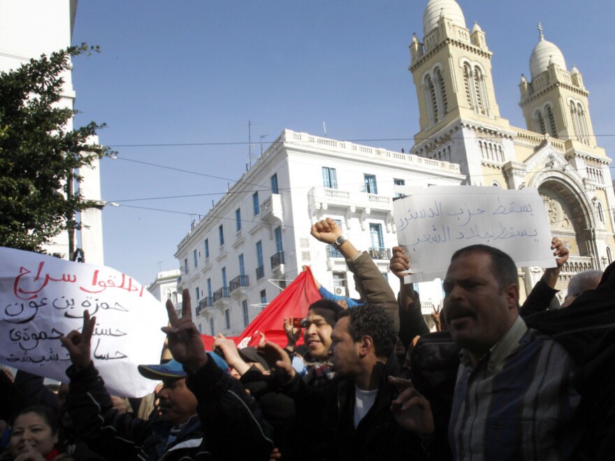 Protesters shouted slogans against former Tunisian President Zine El Abidine Ben Ali during a demonstration Monday in the center of Tunis.