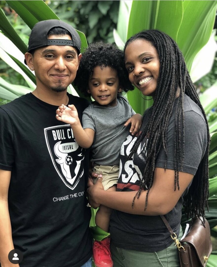 Santibanez with his wife, Amber, and son, Ayo. 