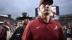 Alabama head coach Kalen DeBoer, front, leaves the field after a loss to Florida State in an NCAA college football game, Saturday, Aug. 30, 2025, in Tallahassee, Fla. (AP Photo/Phelan M. Ebenhack)