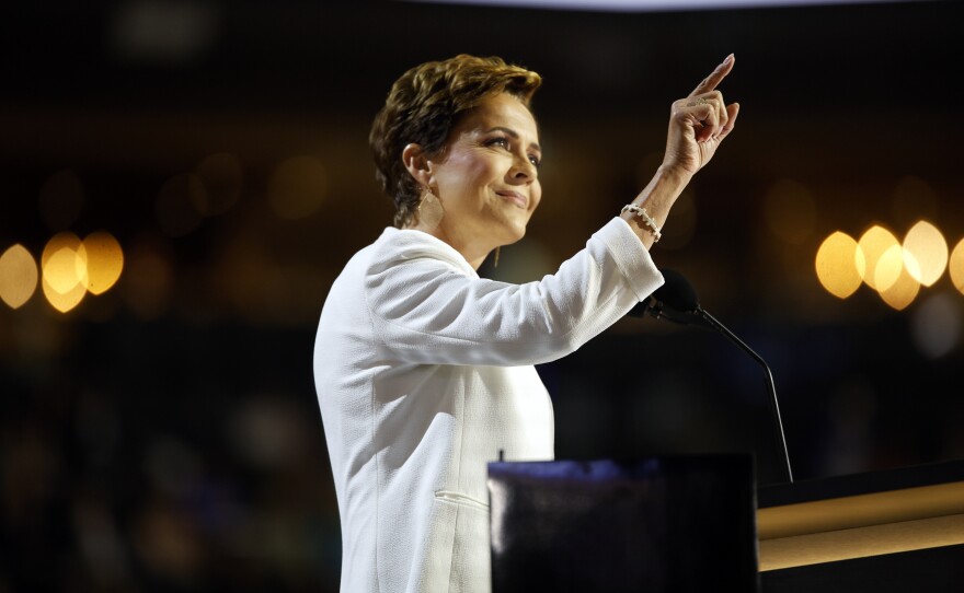 Sen. Kari Lake points toward news stations during the session at the Fiserv Forum for the Republican National Convention in Milwaukee, Wis., Tuesday, July 17, 2024. (Ashleigh Lucas/WUFT News)