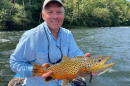 Professor Keith Gido holding a beautiful brown trout