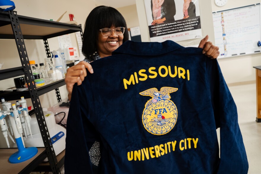 Dr. Pamela Lester holds up the first University City High FFA jacket at the end of her agriculture sciences class on Wednesday, March 4, 2026, in University City, Missouri.