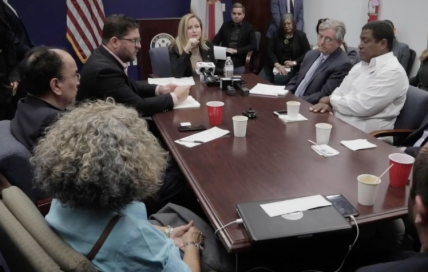 Miami Congresswoman Debbie Mucarsel-Powell (center at head of table) meets with local Venezuelan and Central American community leaders at her offices in Kendall on Tuesday.
