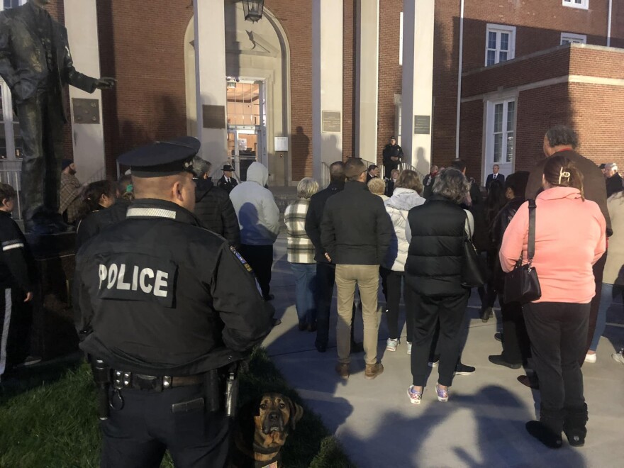 People standing outside the Indiana County Courthouse for a vigil after a shooting near IUP's campus. 
