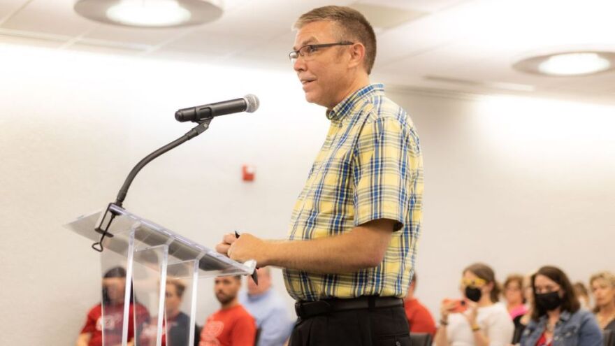 Art Smith speaks at an Independence school board meeting to oppose the board’s decision to remove a book that featured a nonbinary character from elementary schools in 2022. Smith said the incident seriously affected his views of the district.