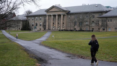 People walk on the campus of Cornell University in Ithaca, New York, Friday, Feb. 2, 2024. (Seth Wenig/AP)