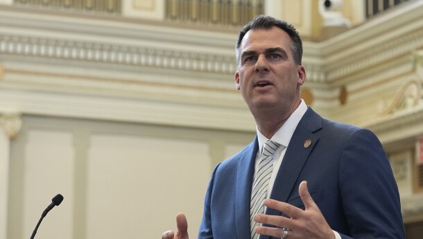 Oklahoma Gov. Kevin Stitt gestures as he delivers his State of the State address Monday, Feb. 6, 2023, in Oklahoma City.