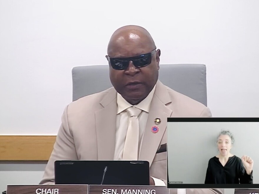 Oregon Sen. James Manning Jr., D-Eugene, chairs the Senate Committee on Veterans, Emergency Management, Federal and World Affairs. He donned dark glasses during the informational hearing on March 5, 2026, necessary following eye surgery.