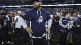 Dallas Cowboys quarterback Dak Prescott walks with crutches before an NFL football game against the Cincinnati Bengals, Monday, Dec. 9, 2024, in Arlington, Texas. Prescott’s injury was emblematic of the Cowboys’ disappointing 2024 season.