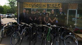 Mayor Hogsett, Chief Riggs, IMPD officers and Freewheelinâ€™ staff, with donated bikes