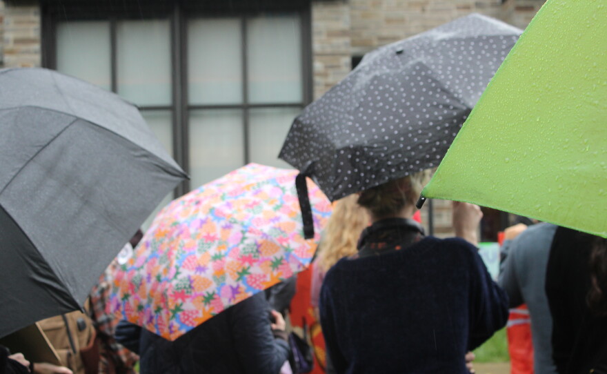 Protesters gathered in a courtyard outside the meeting of the Cornell Board of Trustees on Friday.