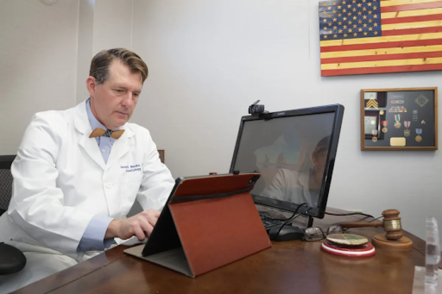 George Monks, a Tulsa dermatologist and former president of the Oklahoma State Medical Association, in his office Dec. 30, 2025.