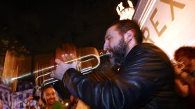 French-Lebanese trumpeter and composer Ibrahim Maalouf performs in the street after a concert at the Grand Rex cinema and concert hall in Paris.