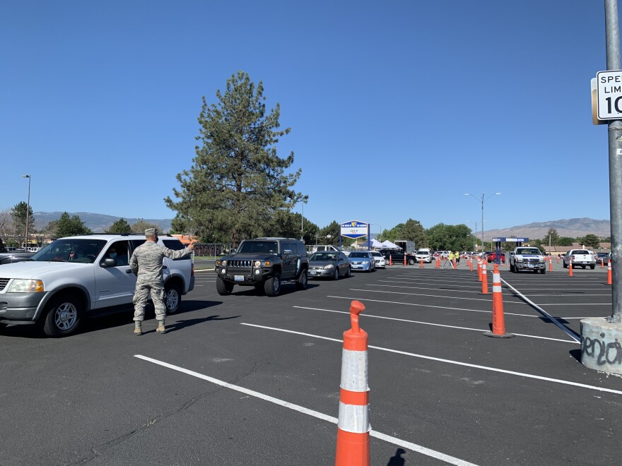 An image of a national guard member directing traffic.