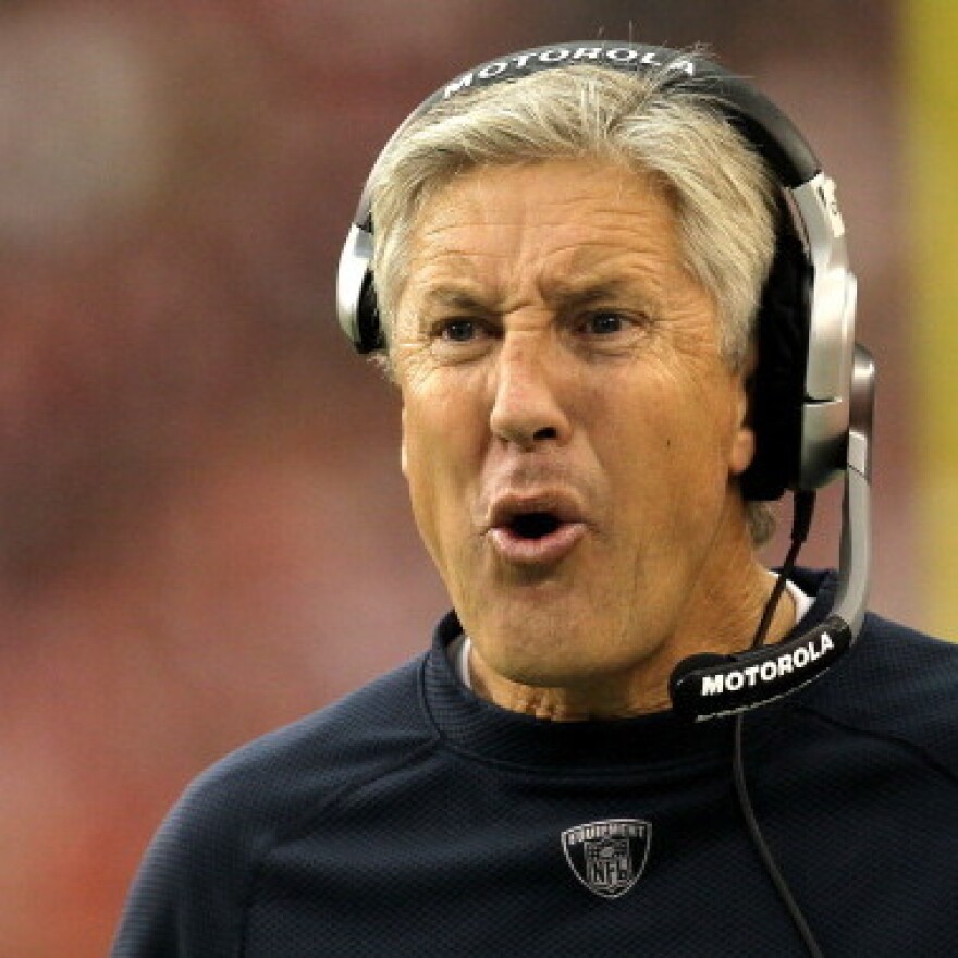 Coach Pete Carroll of the Seattle Seahawks reacts to a referee in 2010.