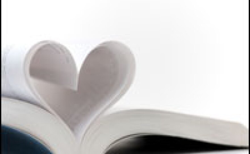 Book with pages making the shape of a heart.