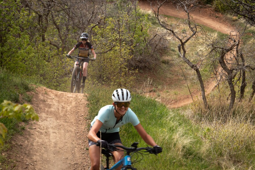 May Miller (foreground) and Ivy Wollenzien hitting the trail in Spanish Fork, April 25, 2026.