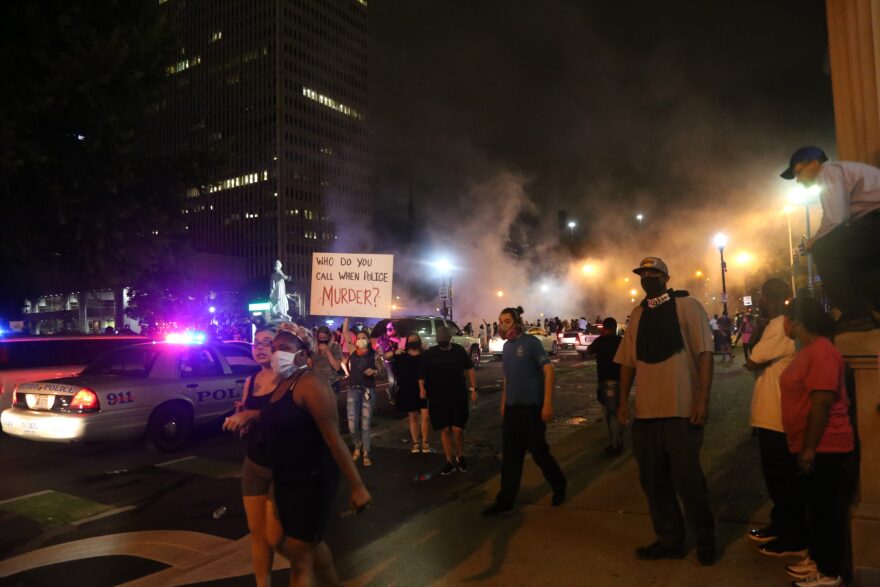 Police fire tear gas and pepper balls on protesters after seven were shot in downtown Louisville on May 28,2020.