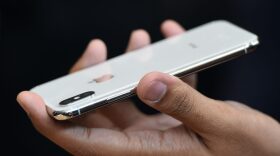 People try out the new iPhone X during a media event at Apple's new headquarters in Cupertino, Calif., on Sept. 12, 2017. (Josh Edelson/AFP/Getty Images)