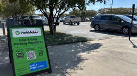 The airport implemented new paid parking on October 1, 2025. The airport has installed temporary signs with parking payment information.