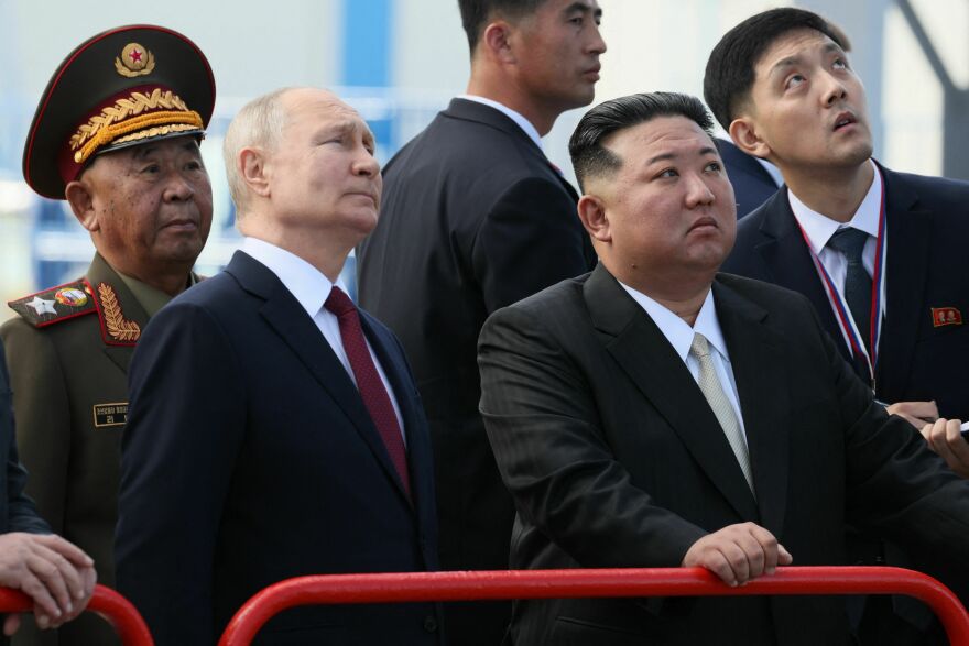 In this pool photo distributed by Sputnik agency, Russian President Vladimir Putin and North Korea's leader Kim Jong Un visit the Vostochny Cosmodrome in the Amur region on Wednesday.