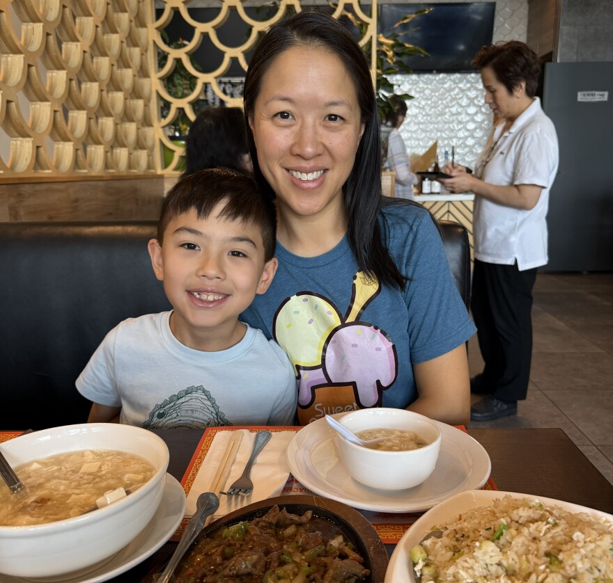 Helen Yung at Hao Hao with her son.