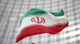 FILE PHOTO: Iranian flag flies in front of the UN office building, housing IAEA headquarters, amid the coronavirus disease (COVID-19) pandemic, in Vienna, Austria, May 24, 2021. REUTERS/Lisi Niesner/File Photo