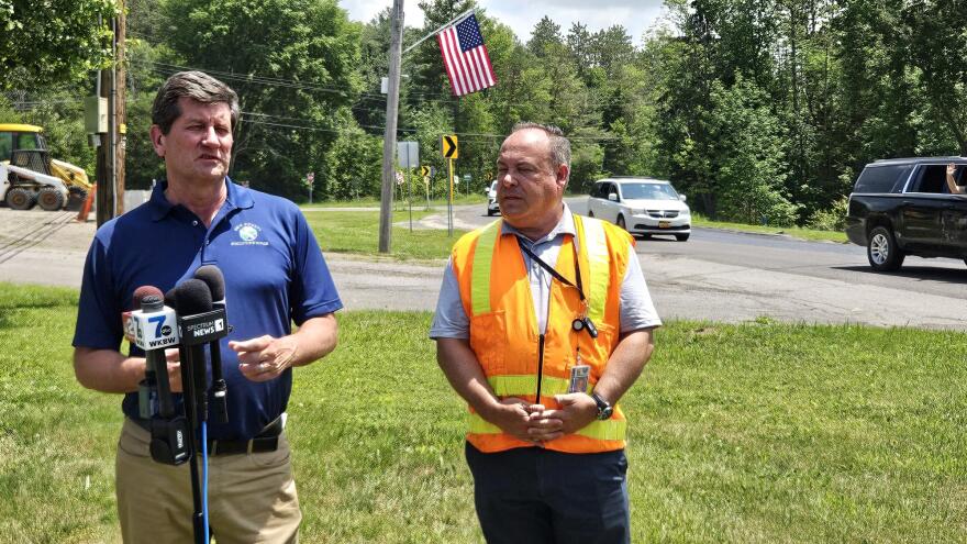 Erie County Executive Mark Poloncarz, left, and Department of Public Works Commissioner Bill Geary describe challenges with continuing road construction in the summer heat.
