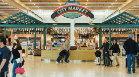 Concourse B of the new KCI terminal features Kansas City restaurants including Pigwich and Taste of Brazil, located in a shopping node decorated to look like KC’s City Market.