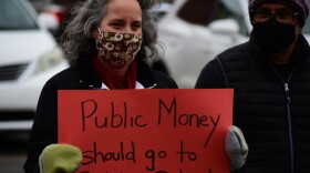 Public school teachers in Goshen organized a protest against legislation to expand school choice in Indiana on Feb. 24.