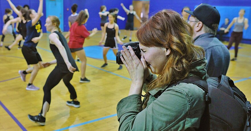 photographer Shane Wynn takes photos at a dance practice