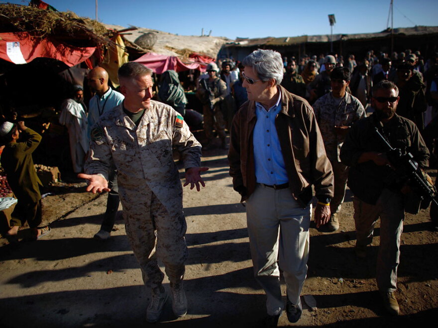 Sen. John Kerry (D-MA) walks through the Garmsir marketplace in Helmand province.