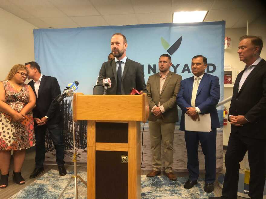 Vineyard Wind CEO Lars Pedersen speaks at the ribbon-cutting of the company’s new Bridgeport offices.
