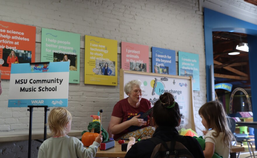 Family participating in musical activity with MSU Community Music School