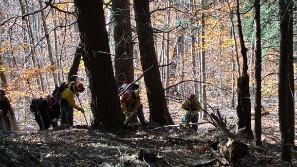 Fire crews are continuing to put out the fire Wednesday after completely containing it Tuesday night.