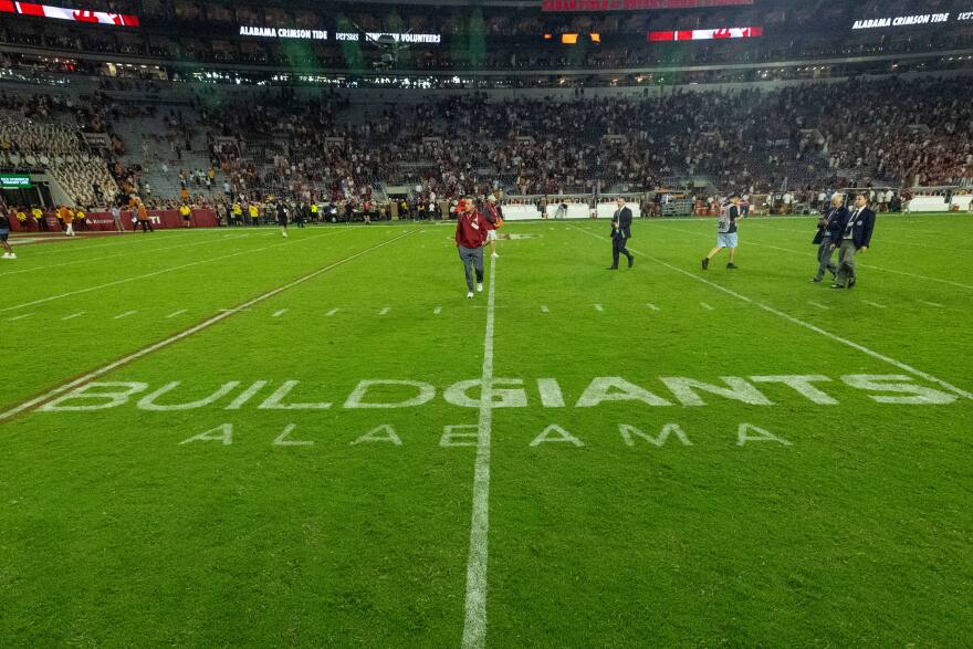 The University of Alabama partnered with the U.S. Navy's Maritime Industrial Base program to add "Build Giants Alabama" logos on both 25-yard lines, seen after Alabama's 37-20 win over Tennessee at an NCAA college football game, Saturday, Oct. 18, 2025, in Tuscaloosa, Ala. (AP Photo/Vasha Hunt)