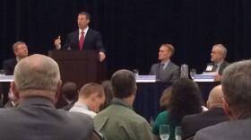 U.S. Rep. Markwayne Mullin (R-Okla. 2) addresses attendees during the 2014 Governor's Water Conference while U.S. Rep. Frank Lucas (R-Okla. 3) and U.S. Rep. James Lankford (R-Okla. 5) look on.