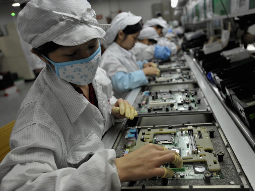 Workers at a Foxconn plant in Shenzhen, China, in 2010.