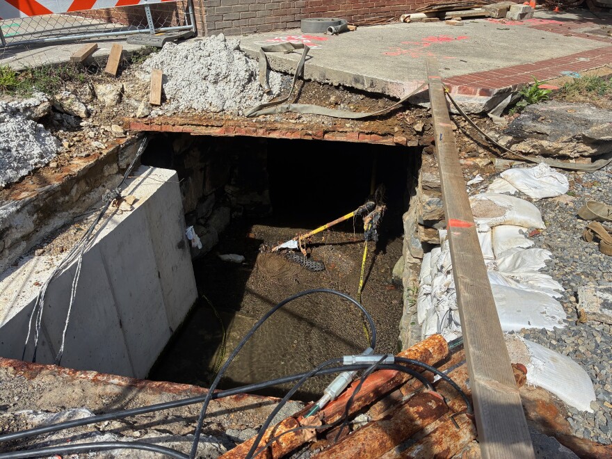 The excavation of First Street allows for a glimpse of Trout Run, a stream that flows beneath downtown Roanoke.