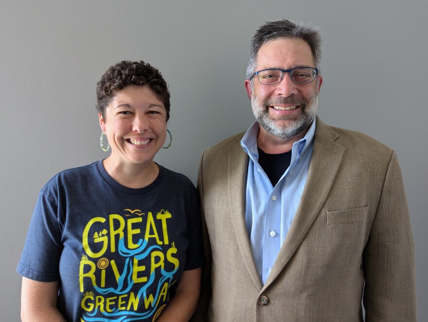 Emma Klues, left, and Shawn Leight, right, pose for a photo at St. Louis Public Radio in Grand Center on Wednesday, July 23.