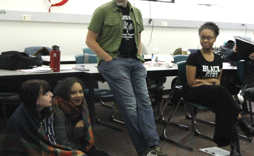 Jon Greenberg, center, includes aspects of ethnic studies in his 12th-grade Social Justice and Civic Engagement class – something his students say helps them understand themselves and the world around them.