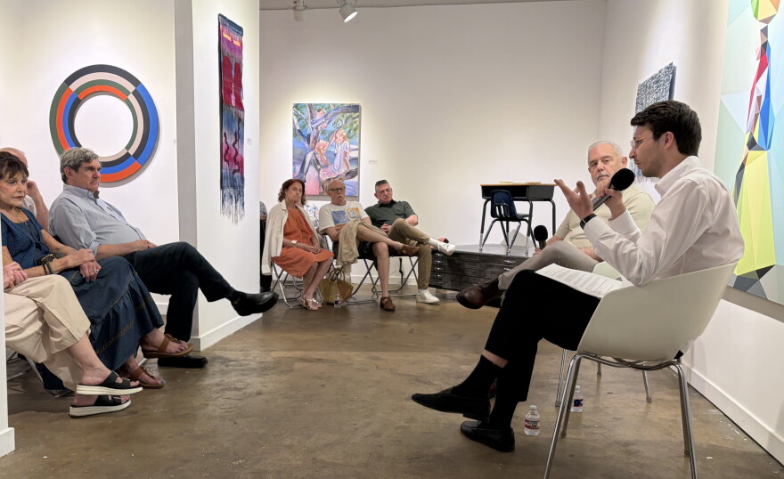 William Bardin, right, and Steve Green discuss the history of Craighead Green Gallery and its future as Bardin Gallery at an August event.
