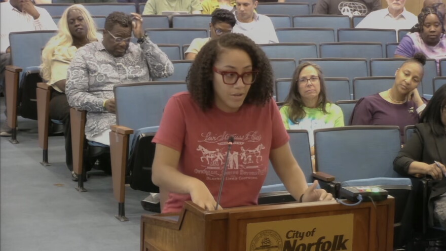Resident and community organizer with the New Virginia Majority, Monet Johnson addresses the Norfolk City Council during public comment on July 14. Johnson argued that procedural limits on repetitive remarks restrict public access to elected leaders.
