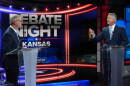 Republican Sen. Roger Marshall, right, and Democratic nominee for U.S. Senate Adam Hamilton participate in a debate in Kansas City, Mo., Wednesday, Oct. 21, 2026. (AP Photo/Charlie Riedel, Pool)