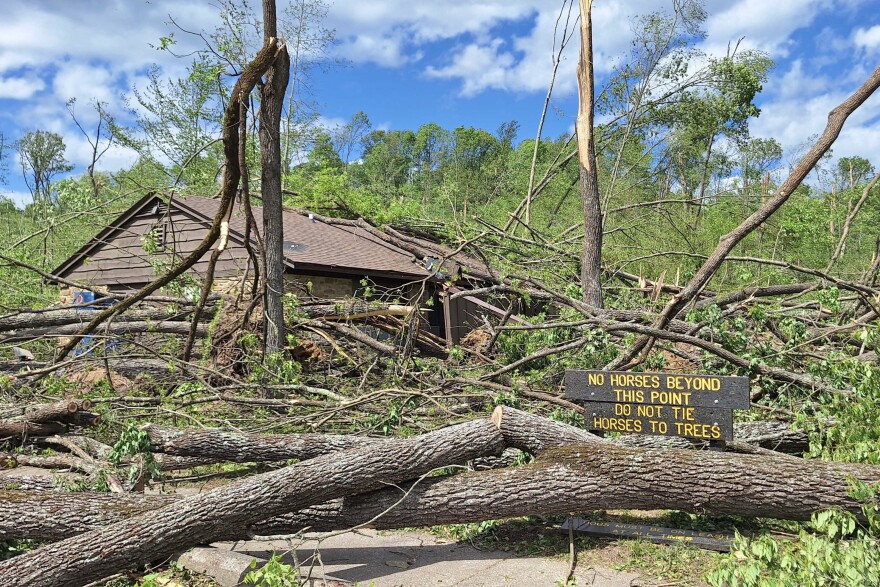 Downed trees cut off access to park buildings and roads.